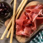 Viaggio tra i sapori italiani: scopri il pregiato Prosciutto di Parma